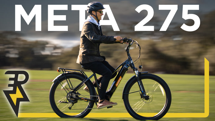 Man riding a Eunorau Meta275 500W Electric Cruiser Bike with Torque Sensor for Commuters