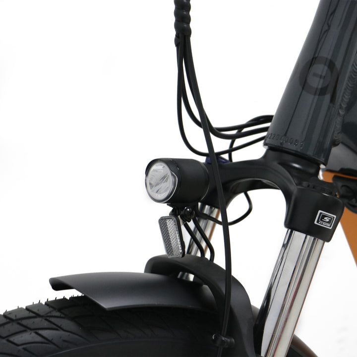 front left view of black Eunorau Meta275 500W Electric Cruiser Bike with Torque Sensor for Commuters with led light and front suspension