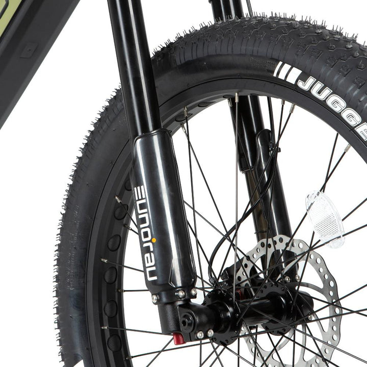 Front shock of the Specter-S Fat Tire Electric Mountain Bike by Eunorau - High-performance off-road full suspension eBike with Bafang Ultra Mid-Drive Motor, dual battery option, advanced suspension, and rugged 26” fat tires, designed for hunters, adventurers, and trail enthusiasts."