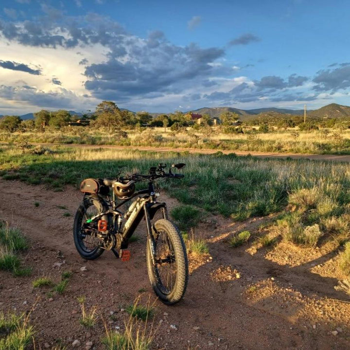 Life style image for the Specter-S Fat Tire Electric Mountain Bike by Eunorau - High-performance off-road full suspension eBike with Bafang Ultra Mid-Drive Motor, dual battery option, advanced suspension, and rugged 26” fat tires, designed for hunters, adventurers, and trail enthusiasts.