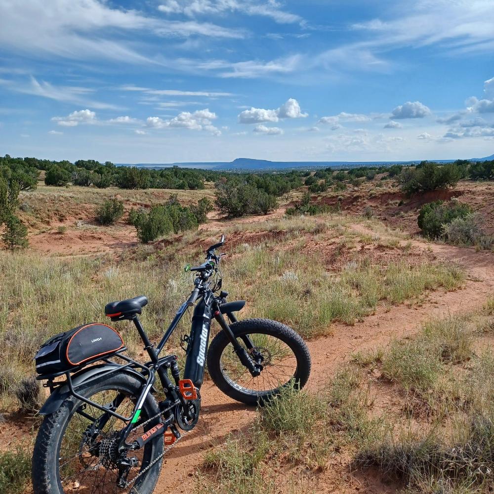 Life style image for the Specter-S Fat Tire Electric Mountain Bike by Eunorau - High-performance off-road full suspension eBike with Bafang Ultra Mid-Drive Motor, dual battery option, advanced suspension, and rugged 26” fat tires, designed for hunters, adventurers, and trail enthusiasts.